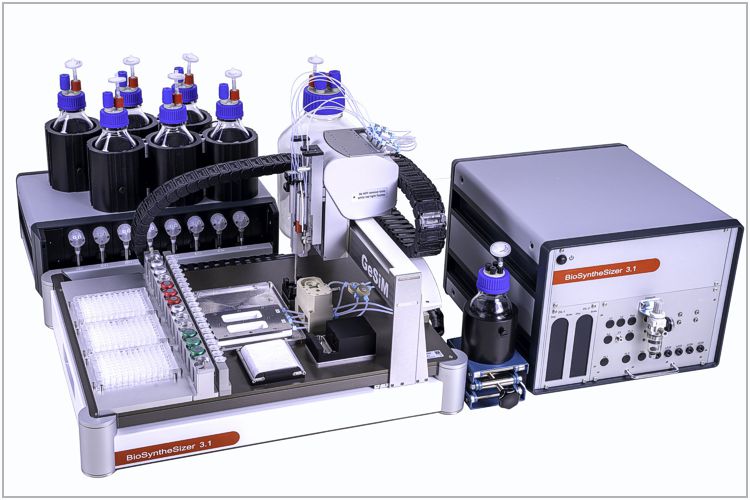 GeSiM BioSyntheSizer with wash tray for slides (middle), well plates for amino acids (left) and syringe unit with reservoir bottles (top). A so called “F-box” (right) comprises control computer, pressure regulation and others.